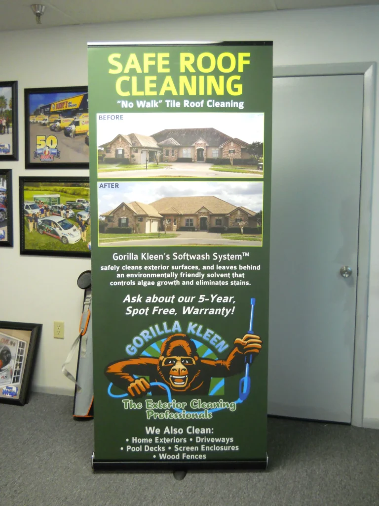 Banner promoting “SAFE ROOF CLEANING”; shows before-and-after roof photos, lists cleaning services, warranty details, and features the Gorilla Kleen mascot with cleaning tools.